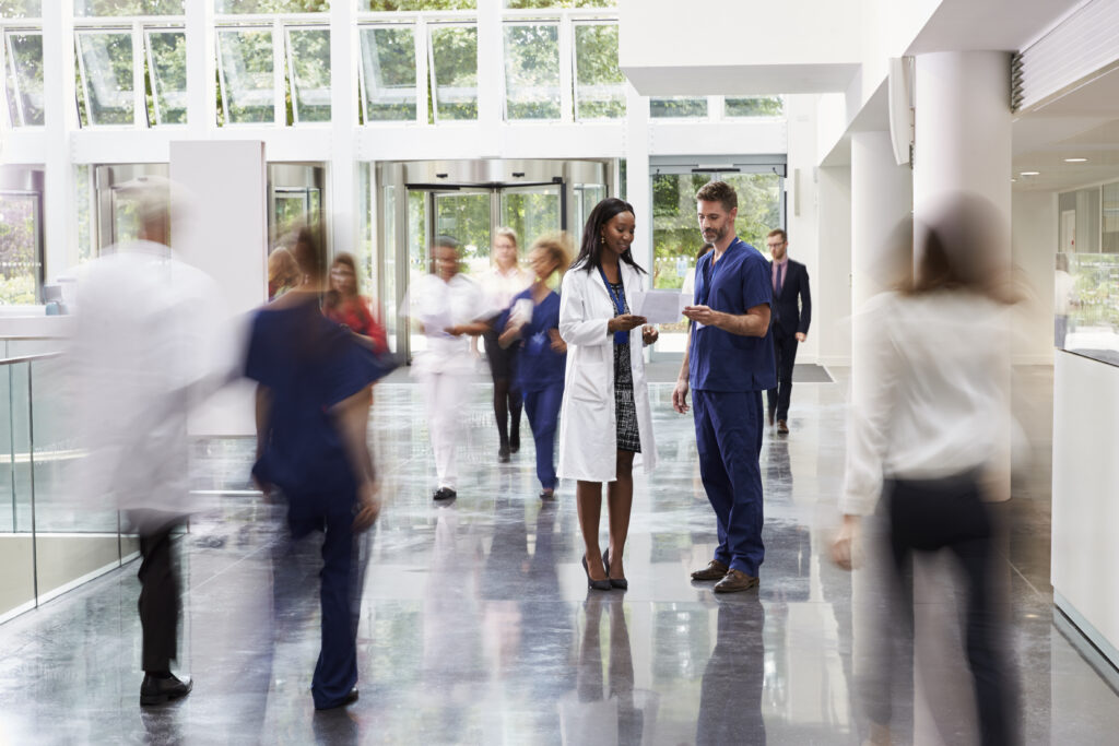 staff,in,busy,lobby,area,of,modern,hospital